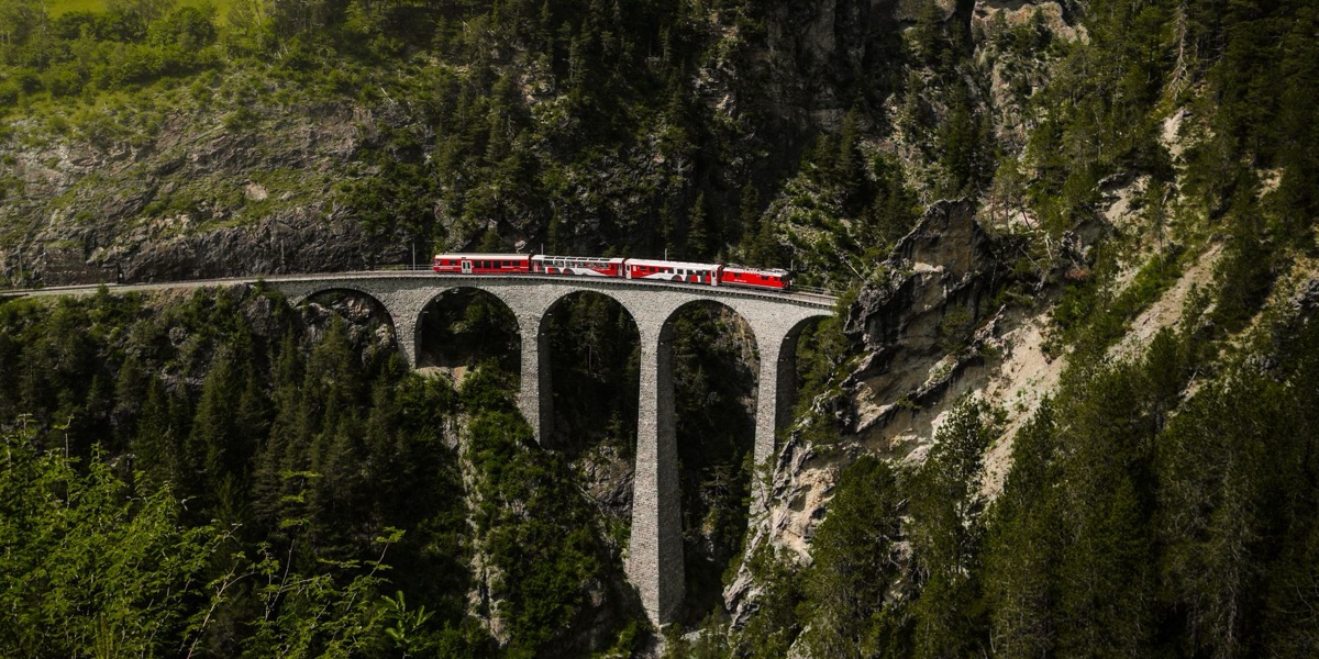 Swiss Travel Pass brochure with mountain range illustration