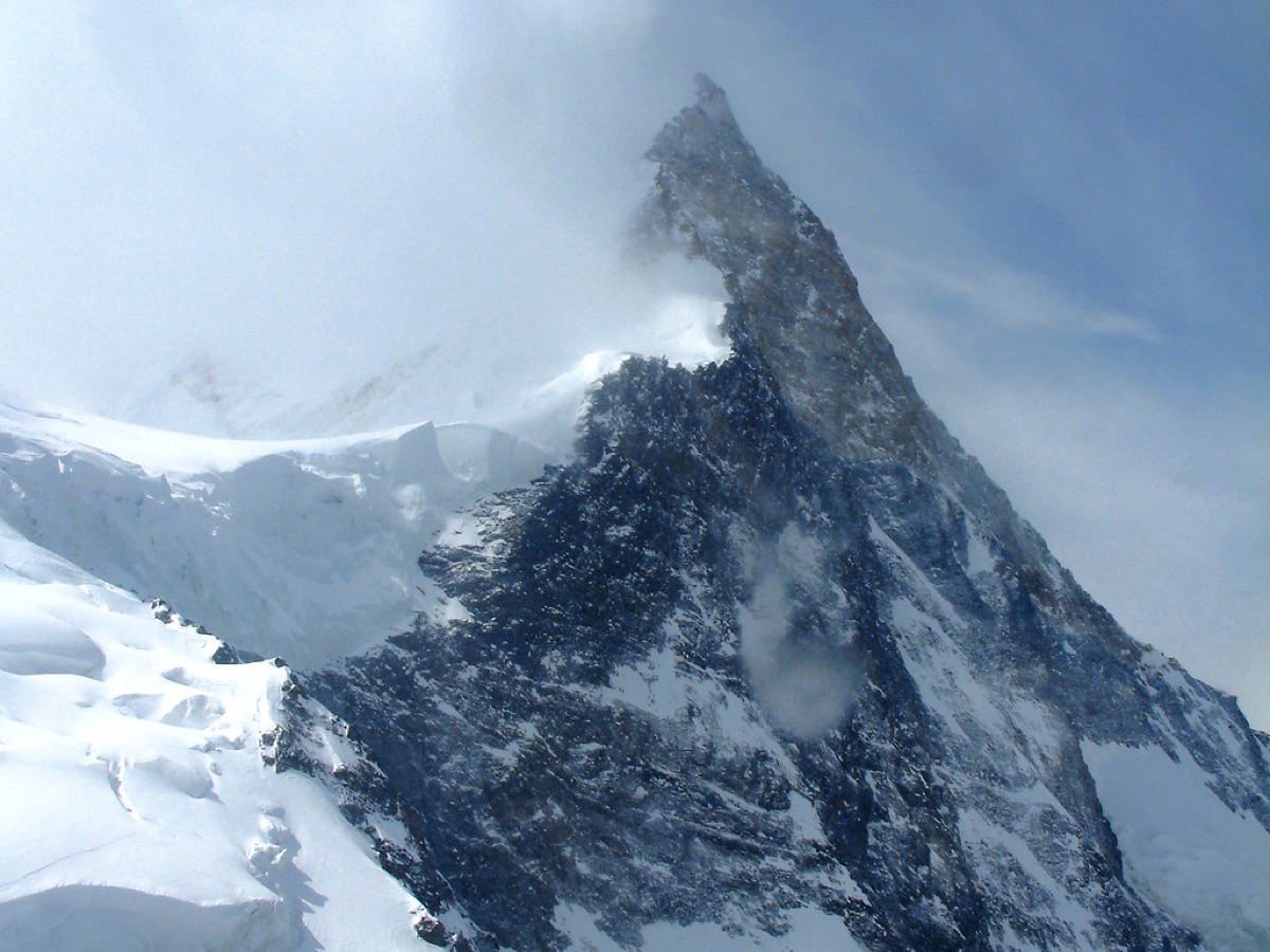 Alpine valley with snow-covered peaks