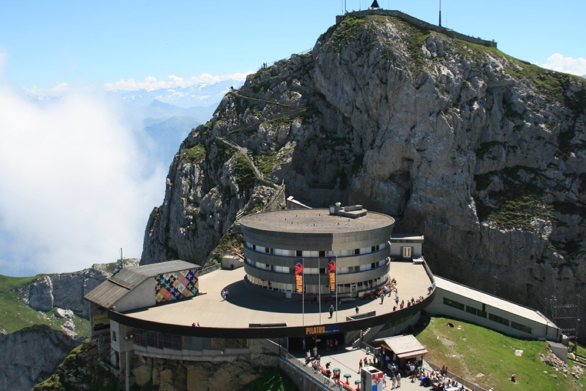 Alpine railway station with snow-covered surroundings
