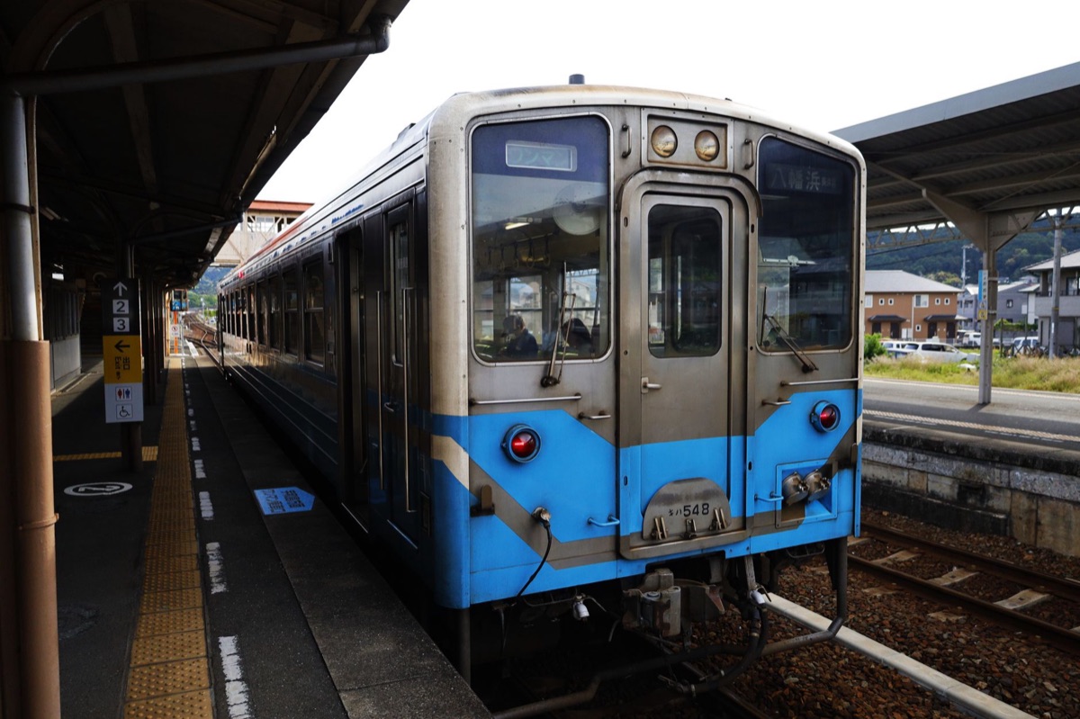 Alpines railway station with locals