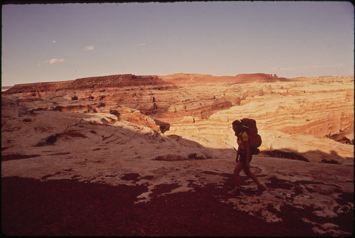 hiker with map and compass