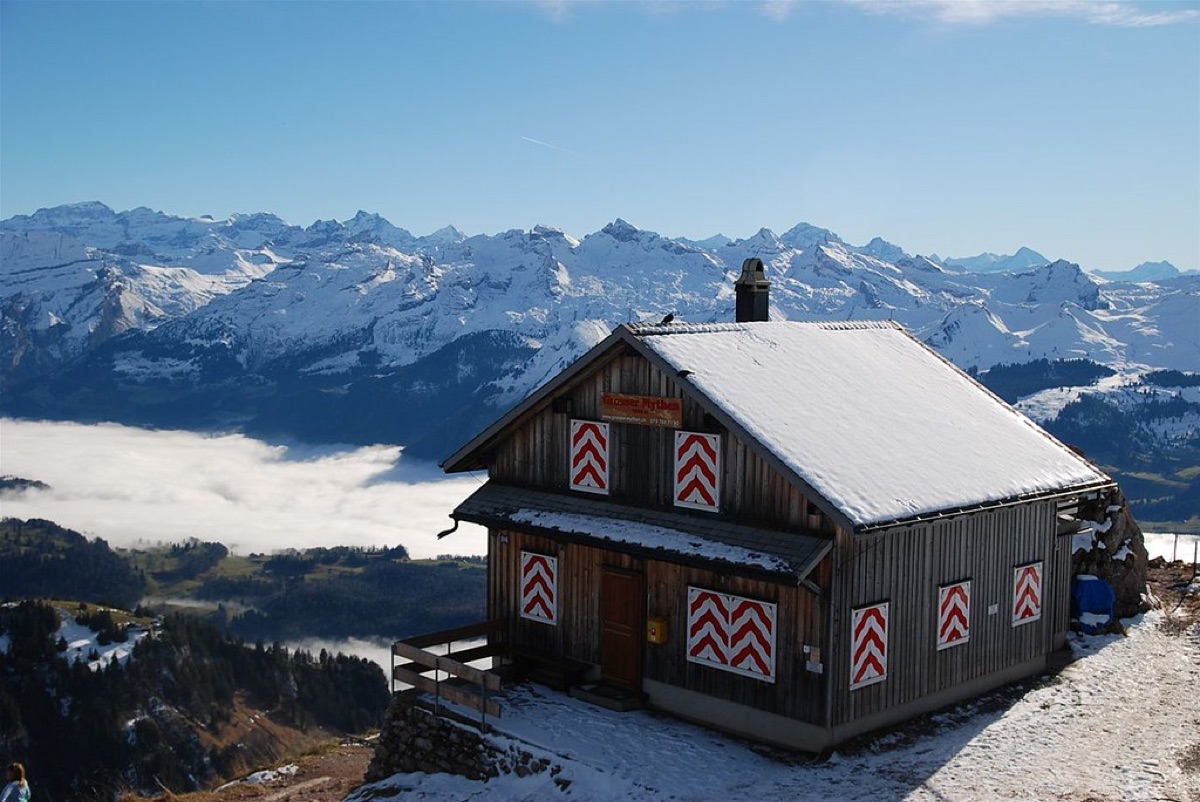 Alpine hütte with snow